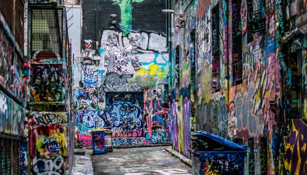 graffiti wall alley during daytime